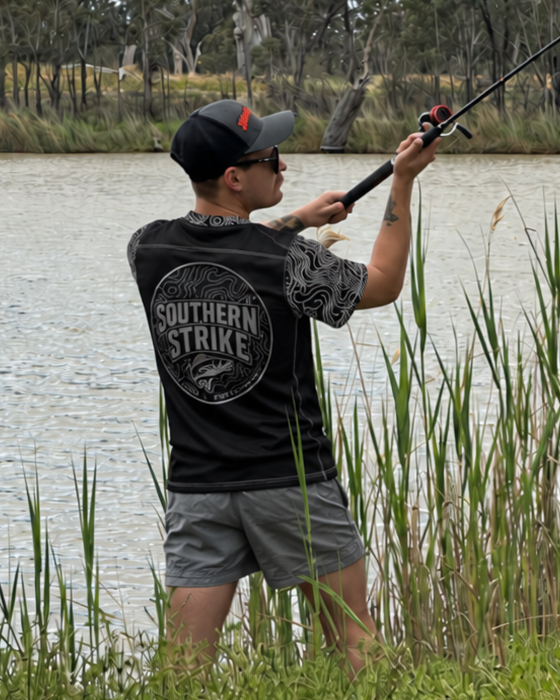 Southern Strike Grey Strike Jersey worn beside the river